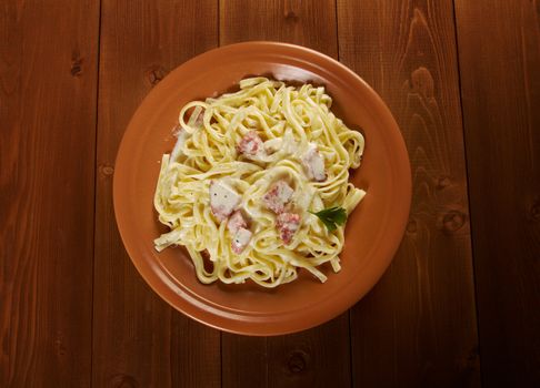 pasta Fettuccine Alfredo with sausage. close-up