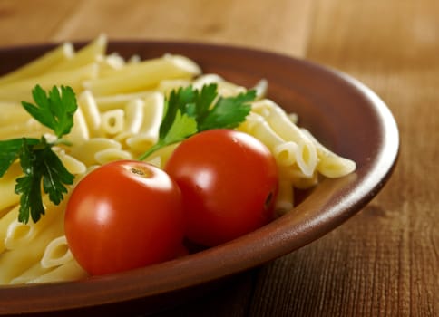 delicious macaroni pasta on wooden table