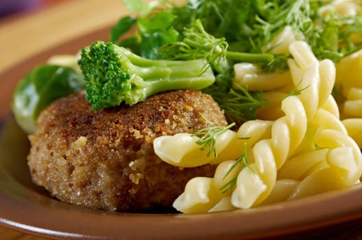 delicious macaroni pasta  with beef cutlets,vegetableon