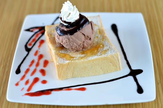 Honey toast  and whipping cream with chocolate ice cream