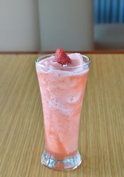 Smoothie strawberry served  with fresh strawberry