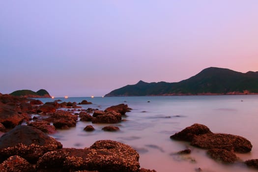 Sunset along the coast under long exposure