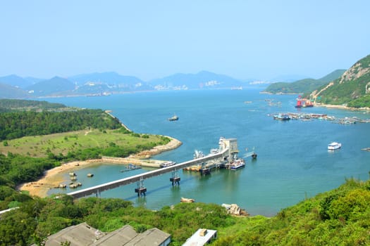 Coastline with mountain ridges in Hong Kong at day time