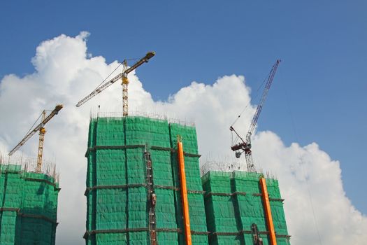 Construction site with crane and building 