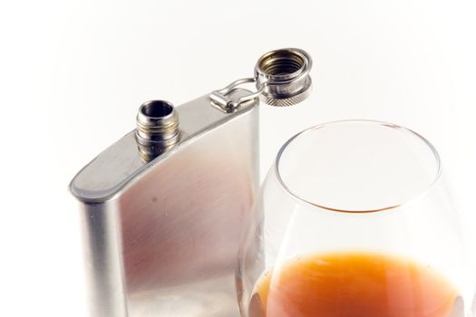 Flask for cognac and whisky from stainless steel  on white background. 