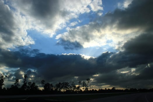 The journey along a road at sunset