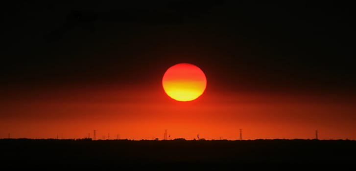 The red and yellow Sunset in the distance