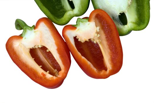 Red and green peppers sliced in half
