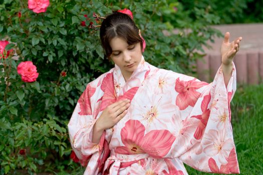 Girl in a pink yukata in the park
