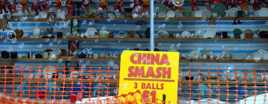 A photo of a china smash game with bubbles going across.