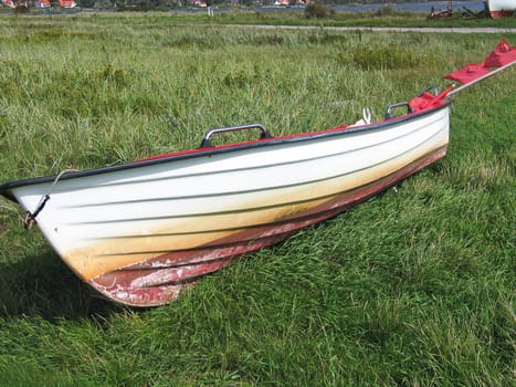 Small fishing Skiff boat on the seashore