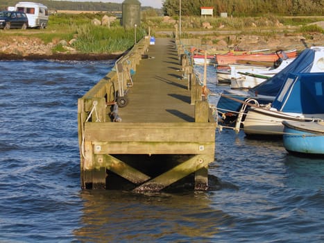 Small beautiful fishing harbor pier dock Funen Denmark