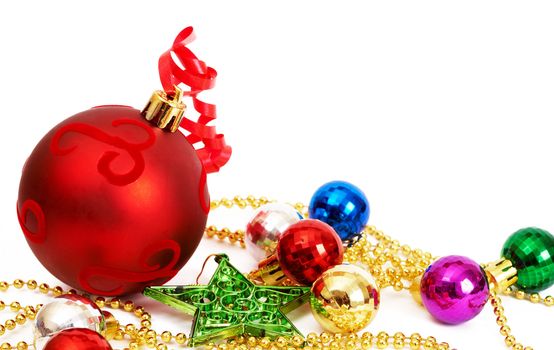 Colorful Christmas baubles and star isolated on white background with copy space. 