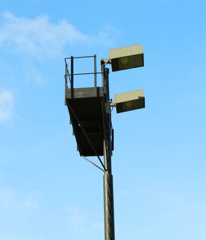 Stadium lights at sunny day