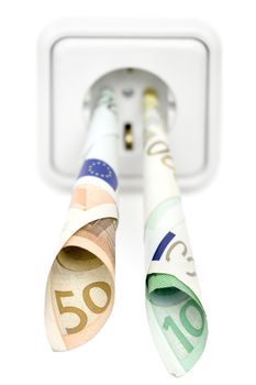 Banknotes attached to a power socket. Isolated on a white background. Shallow depth of field.