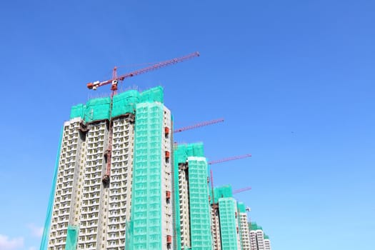 Construction site with crane and building 