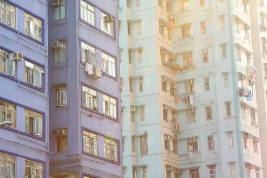 Packed Hong Kong public housing with sunlight