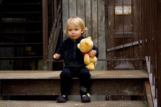 little blonde girl with bear







blonde girl
little girl
child
child with bear
stairs
industrial
city
poor
stair
emotion