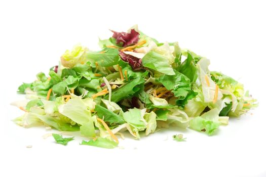 Pile of fresh salad isolated on a white background.