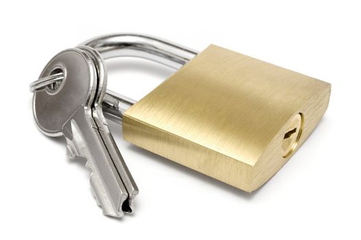 Two keys attached to a golden padlock. Isolated on a white background.