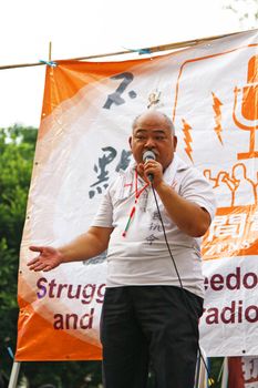 HONG KONG - JUN 4, Tsang Kin-shing at Victoria Park to ask for donation for the expenditure of Citizens' Radio before the commeoration of the 22nd aniversary of the Tiananmen massacre at 4 June, 2011 in Hong Kong. 