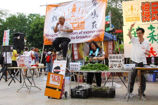 HONG KONG - JUN 4, Tsang Kin-shing at Victoria Park to ask for donation for the expenditure of Citizens' Radio before the commeoration of the 22nd aniversary of the Tiananmen massacre at 4 June, 2011 in Hong Kong. 