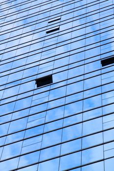 Office windows, blue background.