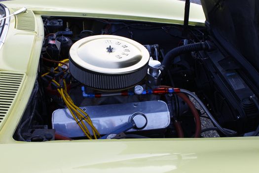 GLOUCESTER, VA, USA - OCTOBER 14: A 1965 Chevy Corvette  at the Middle Peninsula Classic Cruisers Club weekly Car Show. Main Street Center. on October 14, 2011 in Gloucester, VA, USA