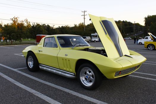 GLOUCESTER, VA, USA - OCTOBER 14: A 1965 Chevy Corvette  at the Middle Peninsula Classic Cruisers Club weekly Car Show. Main Street Center. on October 14, 2011 in Gloucester, VA, USA