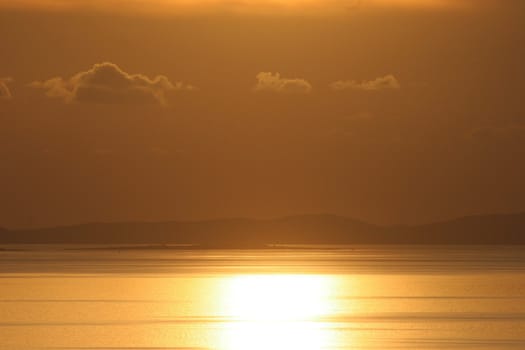 Sunset on the Adriatic sea with clouds