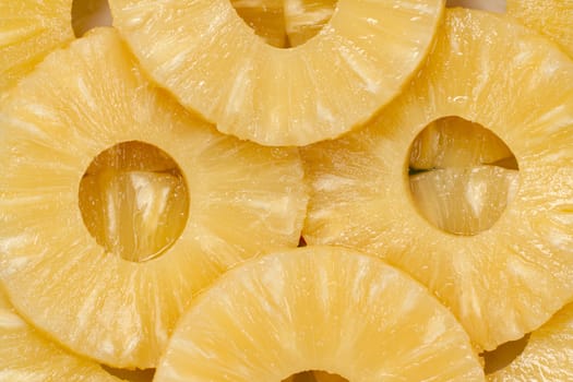 pineapple slices close-up as background