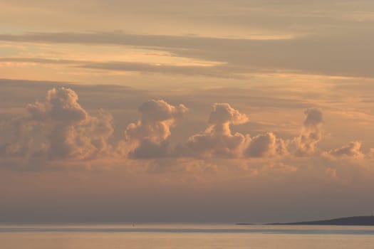 Sunset on the Adriatic sea with clouds