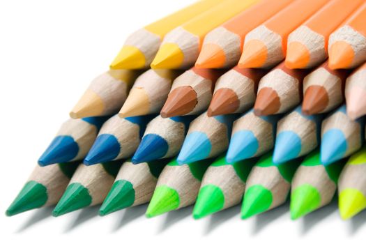 Stack of colorful pencils isolated on a white background.