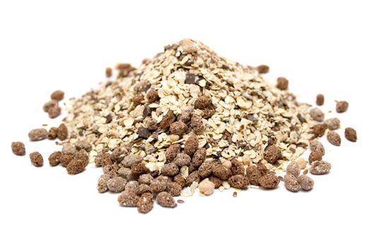 Pile of healthy muesli isolated on a white background.