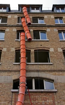 the descent of rubble, work in a brick building