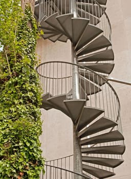 spiral staircase in Paris (France), contrast of two materials