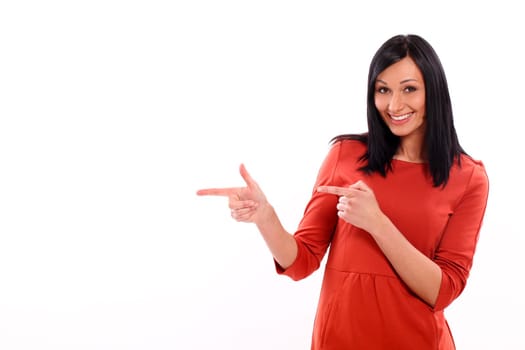 Beautiful caucasian woman shows on something isolated over white background