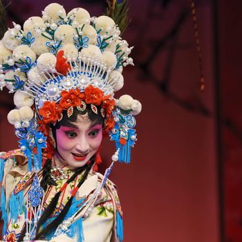 pretty chinese opera actress with traditional costume