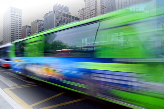 High speed and blurred bus trails on downtown road