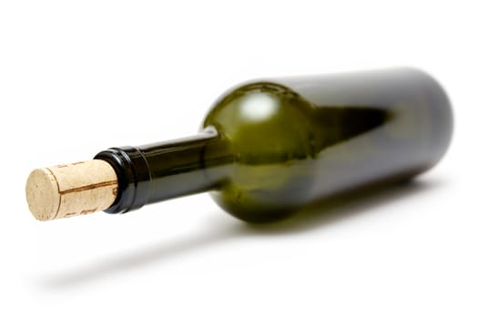 Empty wine bottle isolated on a white background.