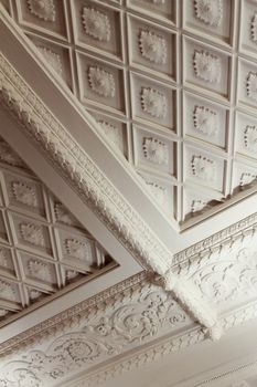 Diamond plaster and bunch moldings on the ceiling texture