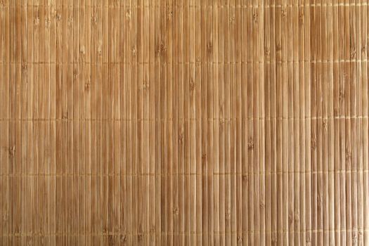 Bamboo sticks background with small cords