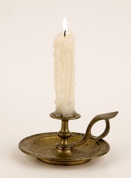 Bronze candlestick. Is used to illuminate the premises