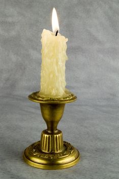 Bronze candlestick. Is used to illuminate the premises