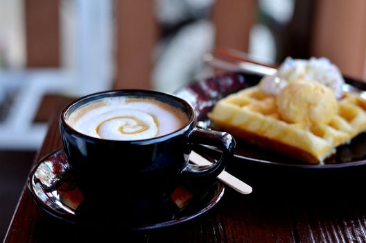 hot coffee served with waffle and icecream