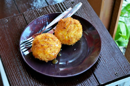 deep fried bread served with honey sauce