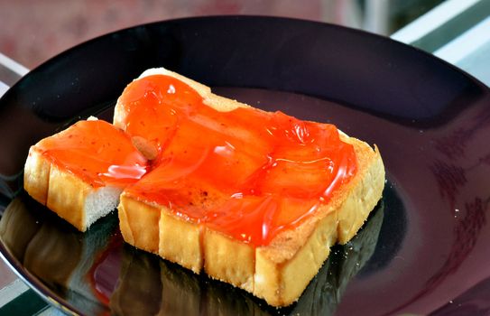 strawberry jam with toast , delicious dessert