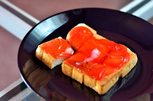 strawberry jam with toast , delicious dessert