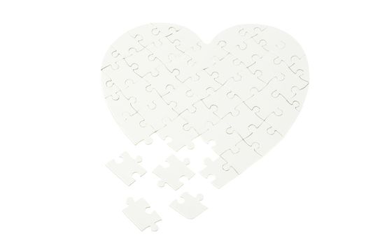 heart made from the puzzle on white