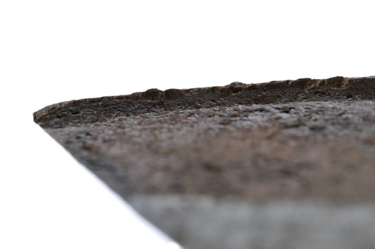 Macro closeup of old pitted rusty blade